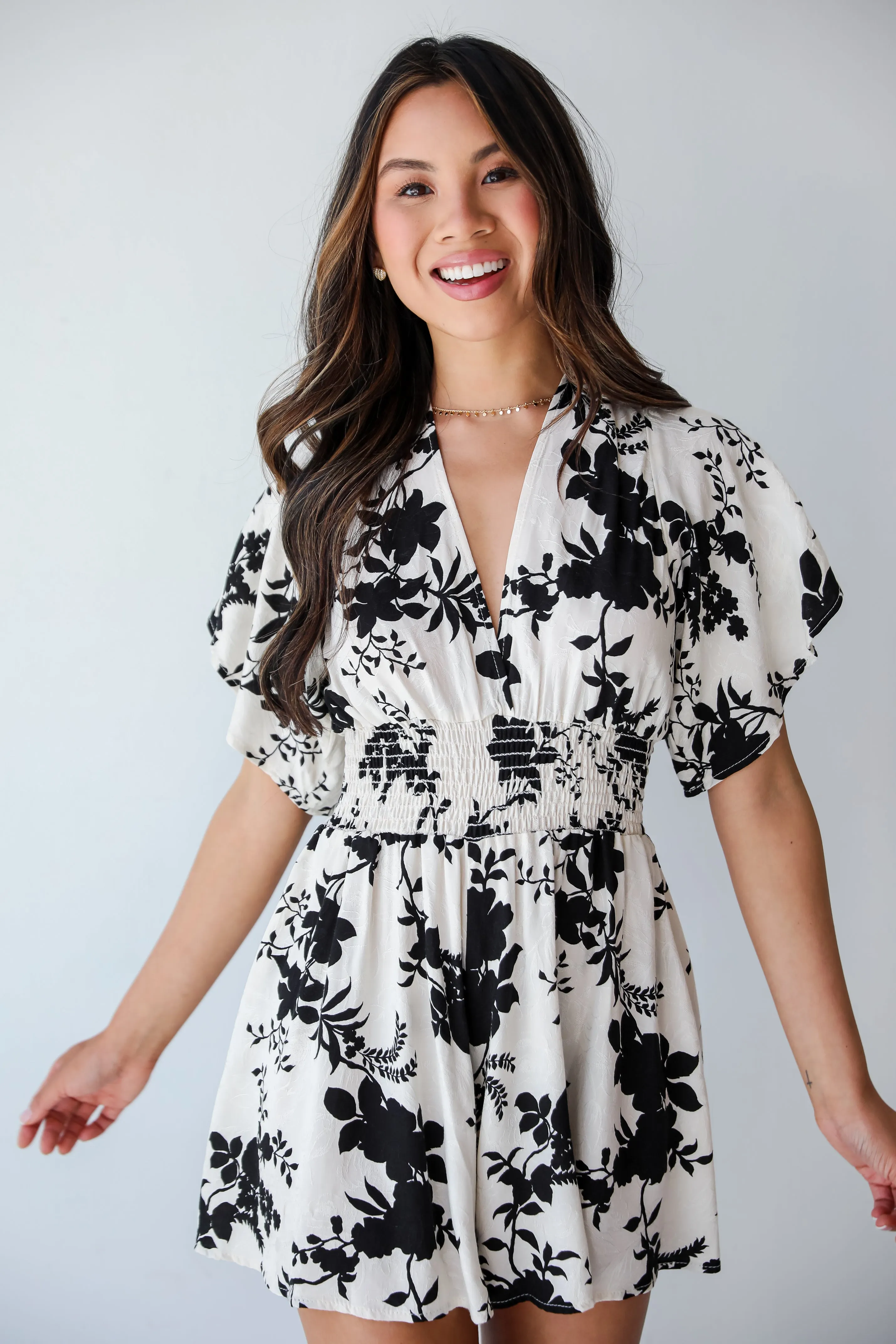 Adorably Elite Ivory Floral Romper